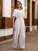Tied Wide Leg Overalls with Pockets sold by Charming Charlie