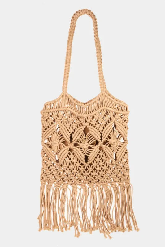 Fame Woven Handbag with Tassel sold by Charming Charlie
