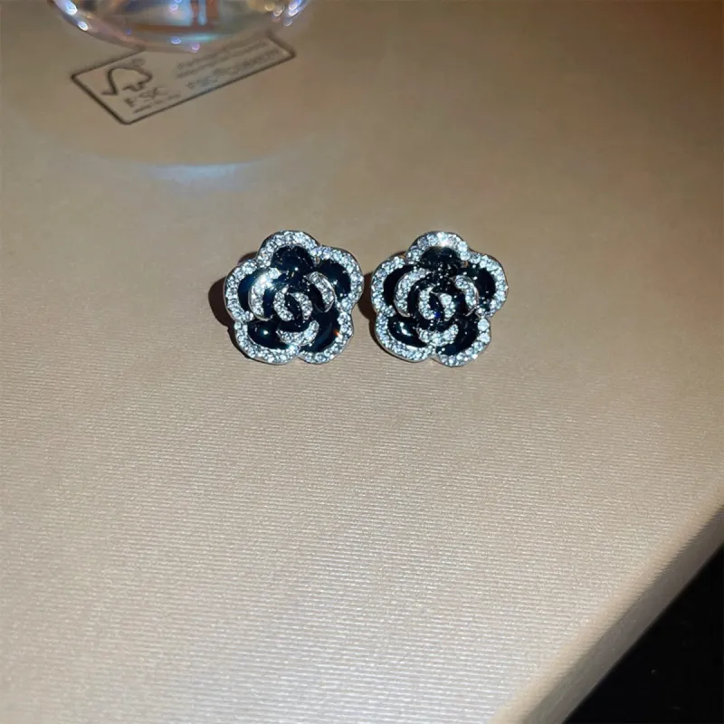 Copper Rhinestone Flower Earrings sold by Charming Charlie
