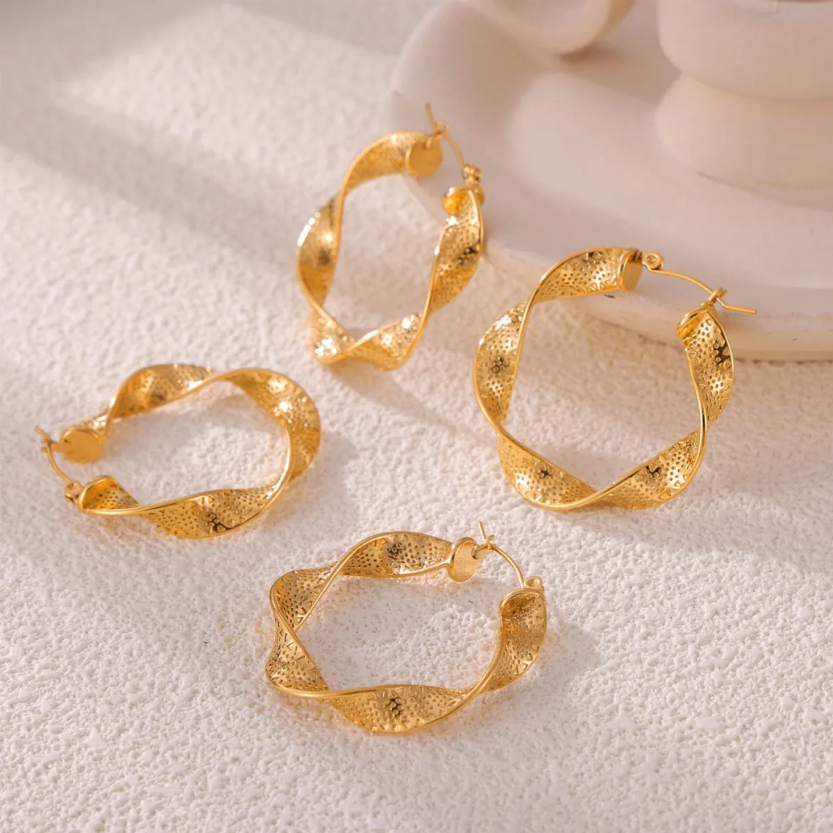 Titanium Steel Twisted Earrings sold by Charming Charlie product image thumbnail 5