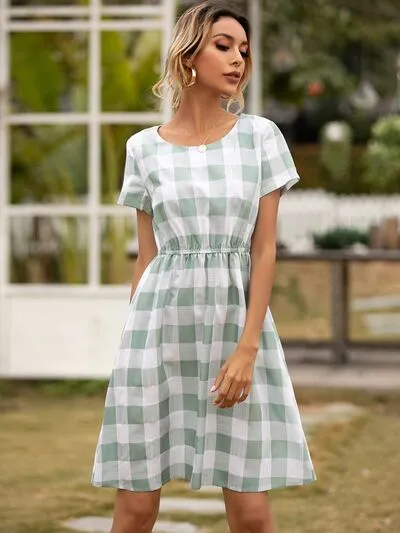 Smocked Plaid Round Neck Short Sleeve Dress sold by Charming Charlie product image thumbnail 2