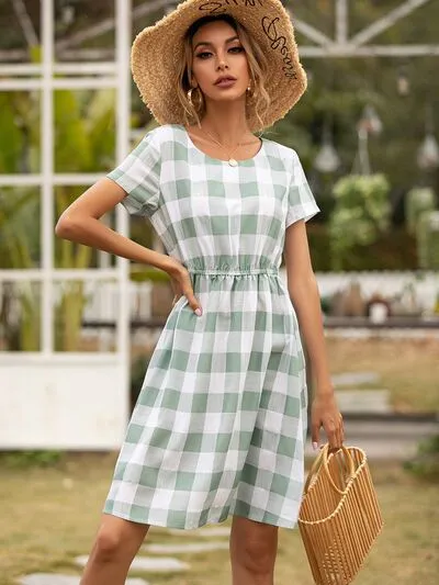 Smocked Plaid Round Neck Short Sleeve Dress sold by Charming Charlie