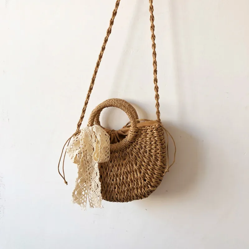 Drawstring Straw Braided Crossbody Bag sold by Charming Charlie