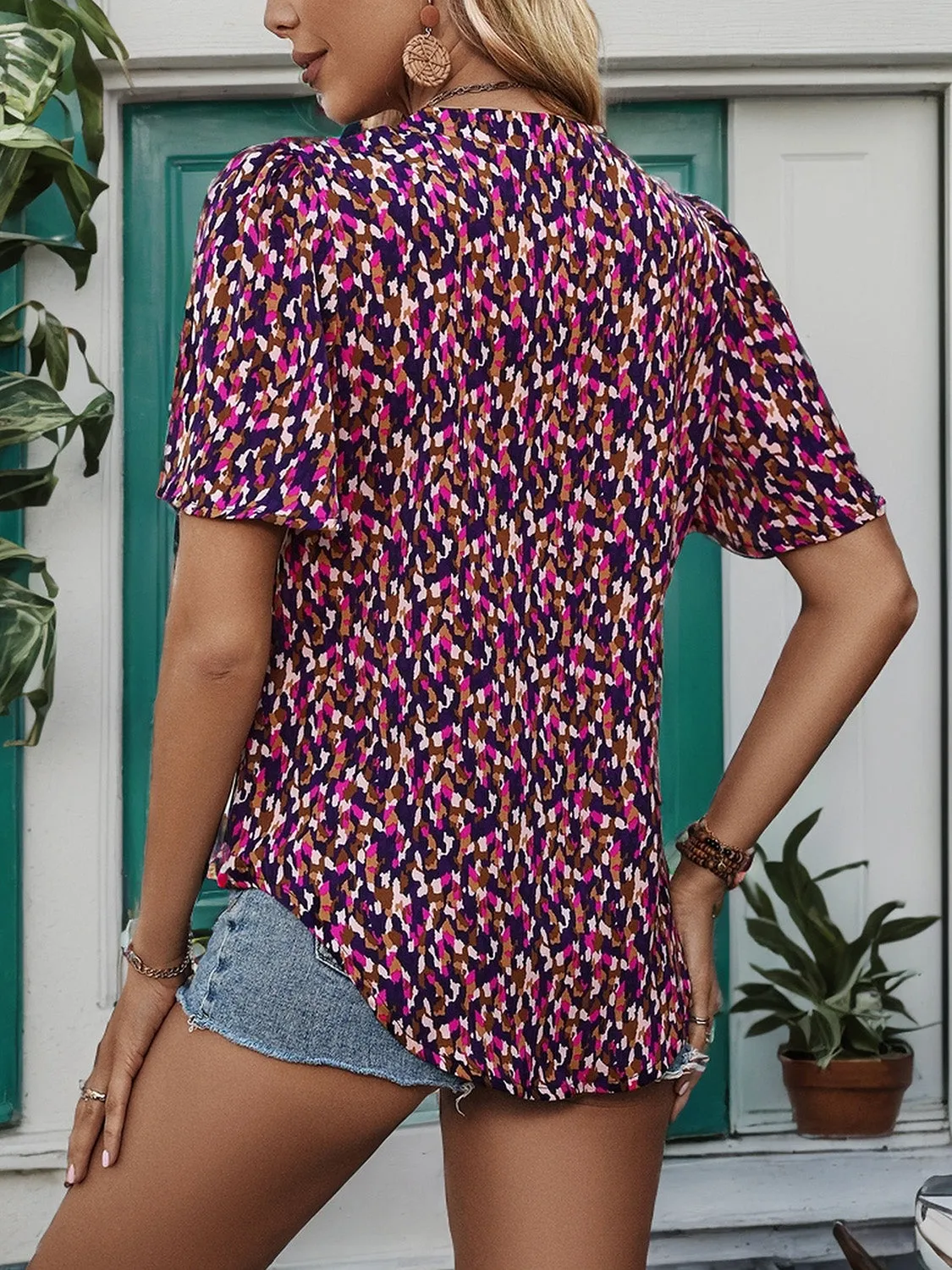 Printed Notched Flutter Sleeve Blouse sold by Charming Charlie product image thumbnail 2