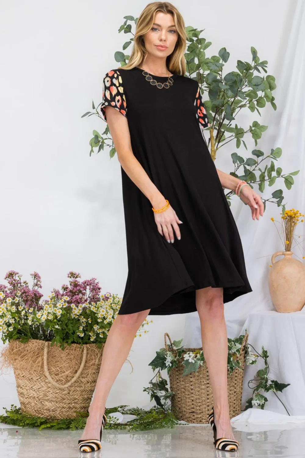 Celeste Full Size Leopard Short Sleeve Dress with Pockets sold by Charming Charlie product image thumbnail 3
