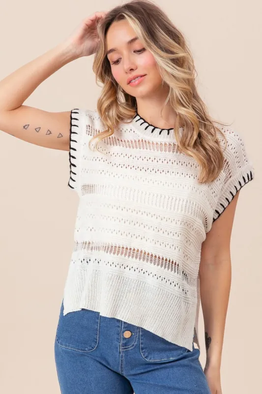 BiBi Stitch Edge Pointelle Side Slit Sweater Vest sold by Charming Charlie