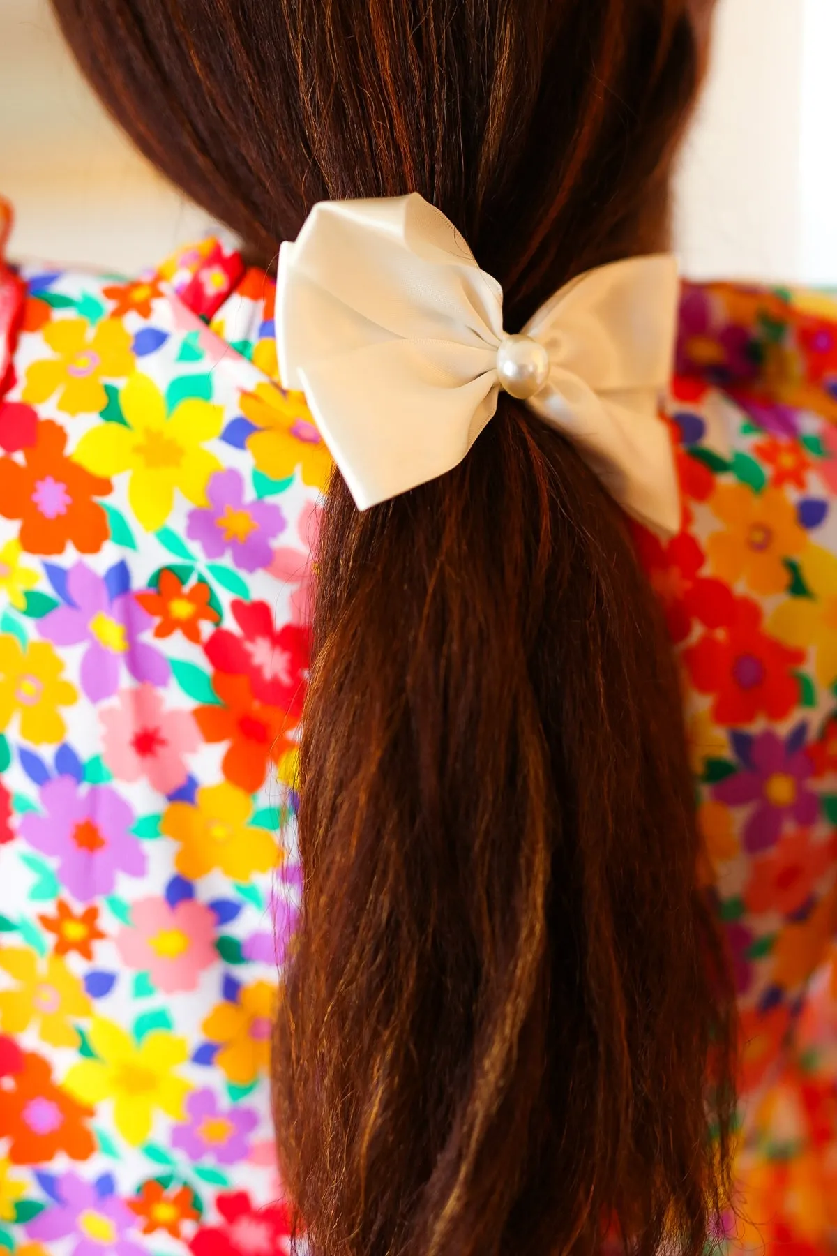 Ivory Satin Pearl Detail Coquette Bow sold by Charming Charlie product image thumbnail 4