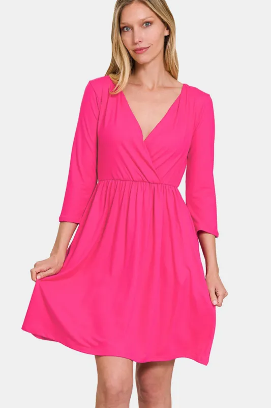 Zenana Three-Quarter Sleeve Surplice Dress with Pockets sold by Charming Charlie