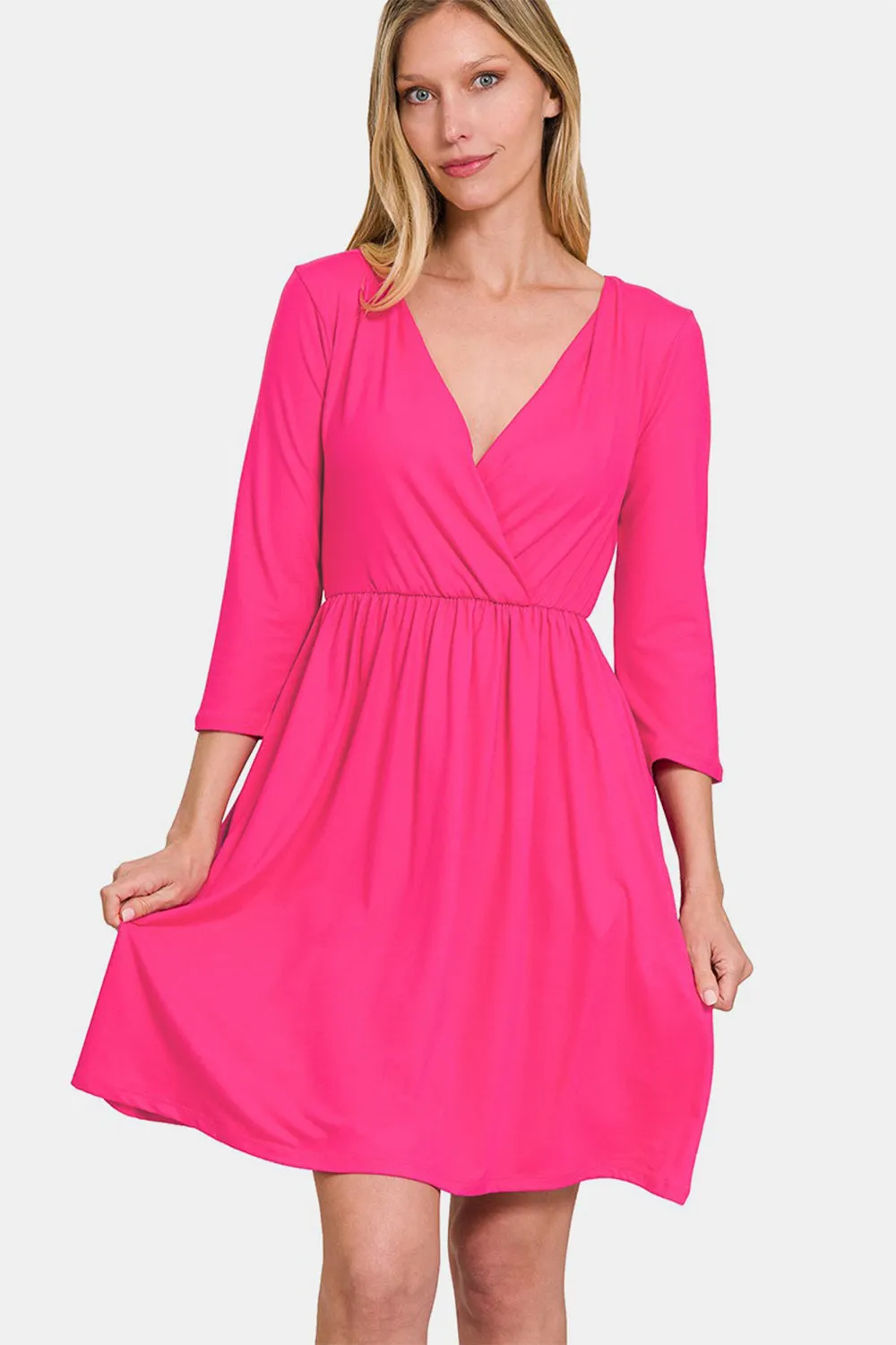 Zenana Three-Quarter Sleeve Surplice Dress with Pockets sold by Charming Charlie