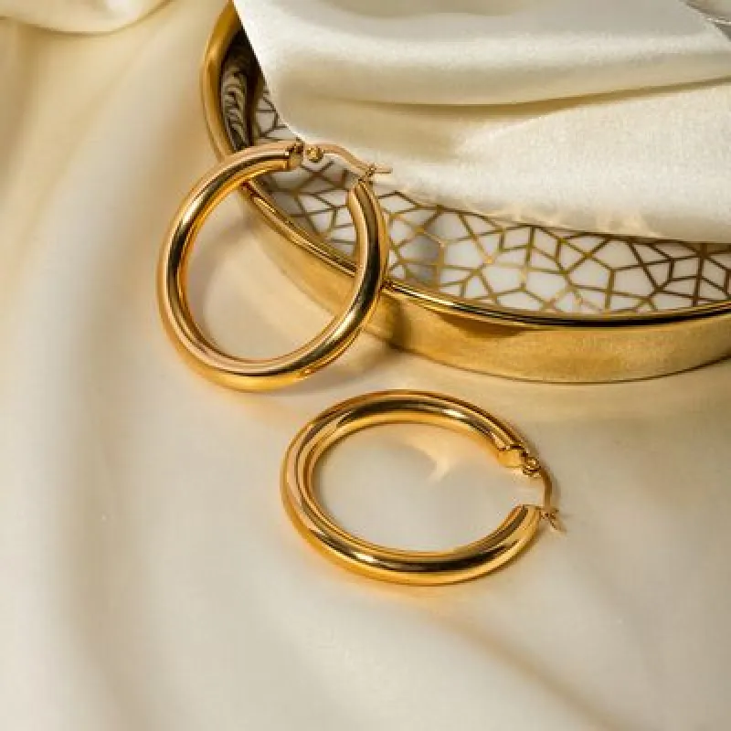 18K Gold-Plated Stainless Steel Huggie Earrings sold by Charming Charlie