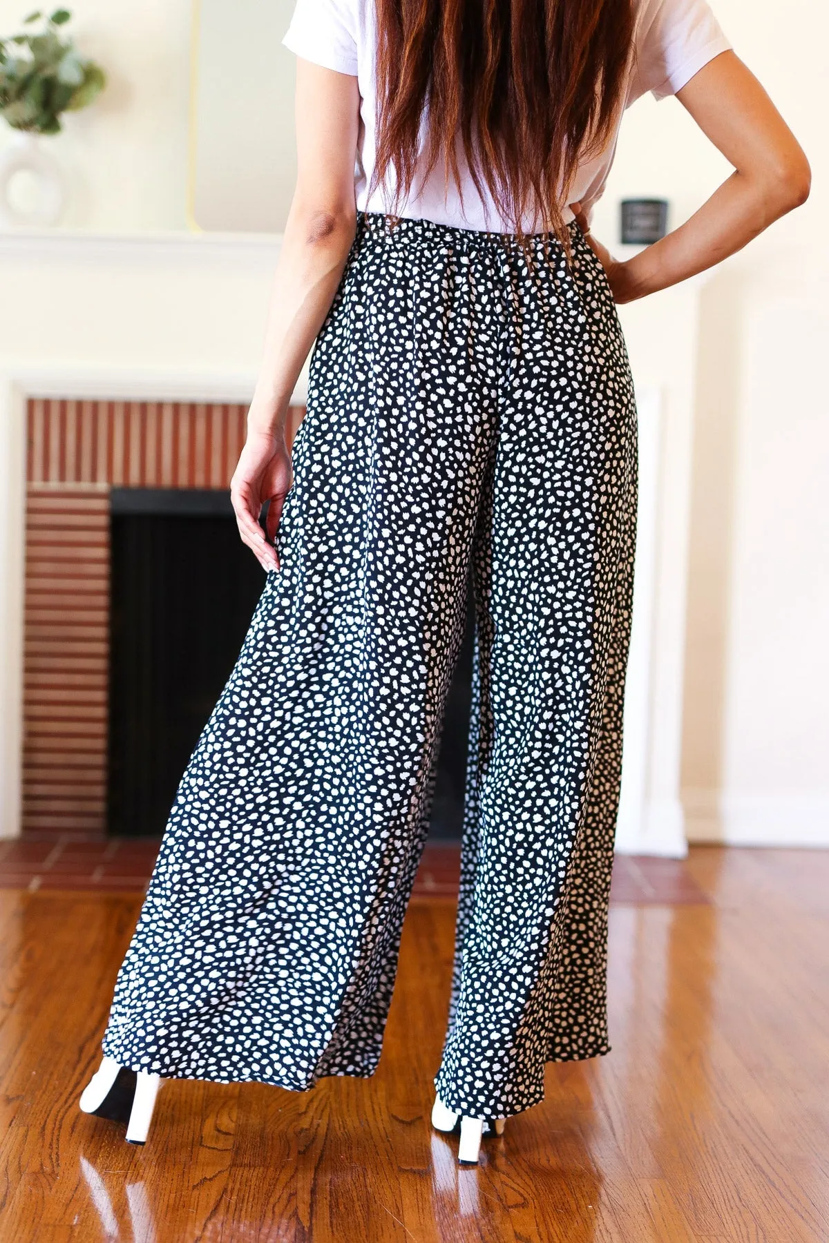 Let's Meet Up Black Animal Print Smocked Waist Palazzo Pants sold by Charming Charlie product image thumbnail 4