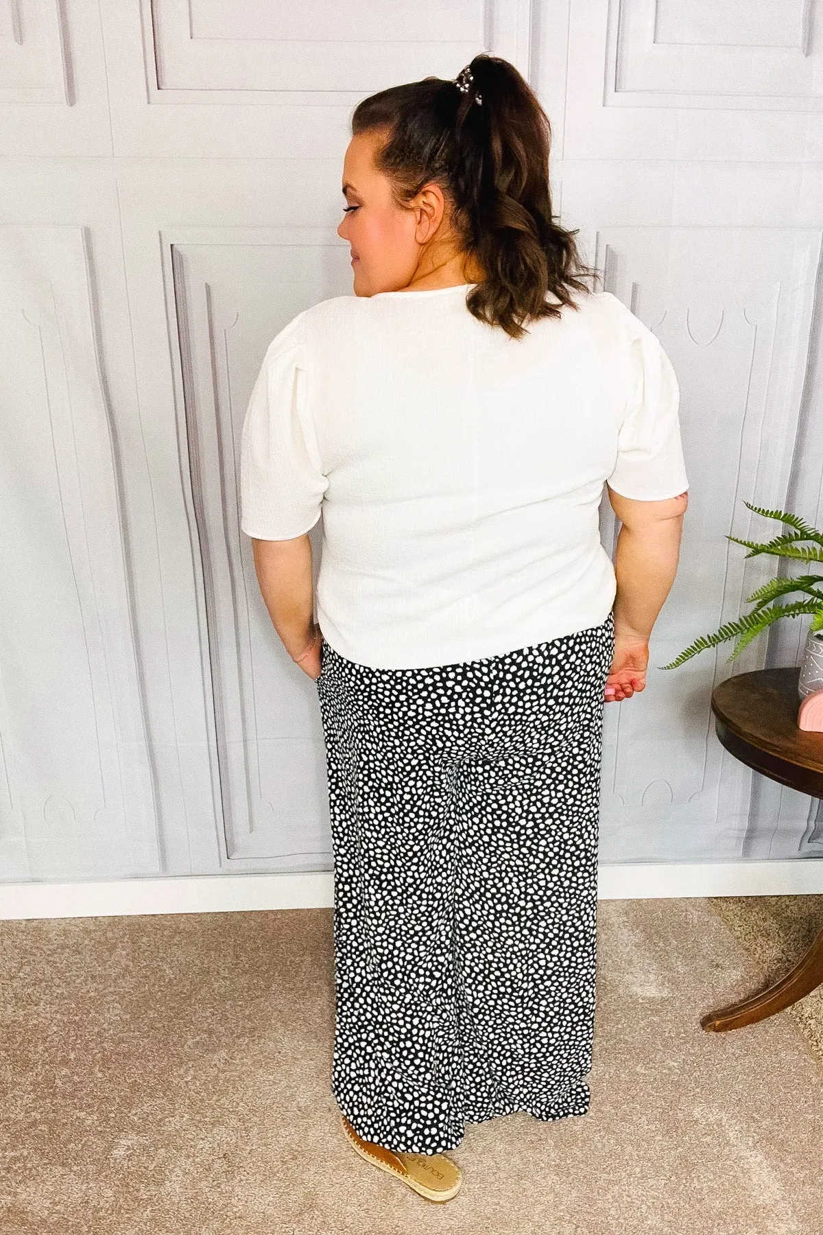 Let's Meet Up Black Animal Print Smocked Waist Palazzo Pants sold by Charming Charlie product image thumbnail 3