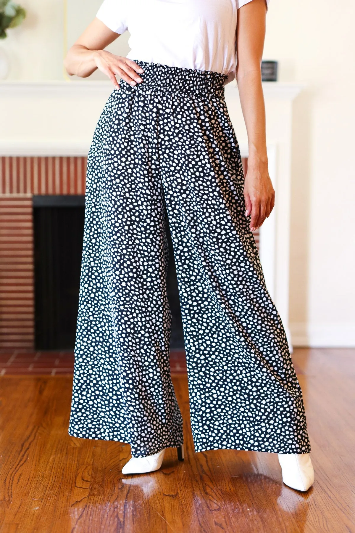 Let's Meet Up Black Animal Print Smocked Waist Palazzo Pants sold by Charming Charlie