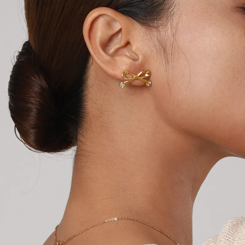 Stainless Steel Inlaid Zircon Bow Earrings sold by Charming Charlie