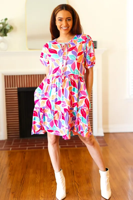 Feel Your Best Multicolor Floral Tiered Front Tie Pocketed Dress sold by Charming Charlie