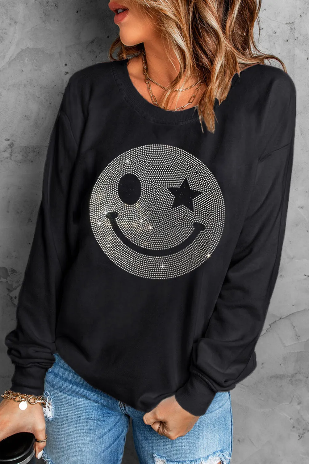 Rhinestone Smile Long Sleeve Sweatshirt sold by Charming Charlie