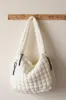 Zenana Quilted Carryall Crossbody Bag sold by Charming Charlie