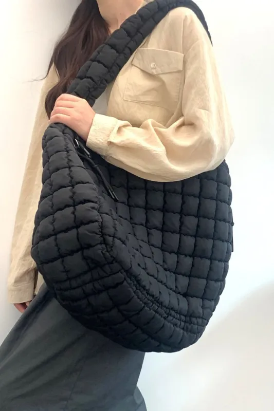 Zenana Quilted Carryall Crossbody Bag sold by Charming Charlie