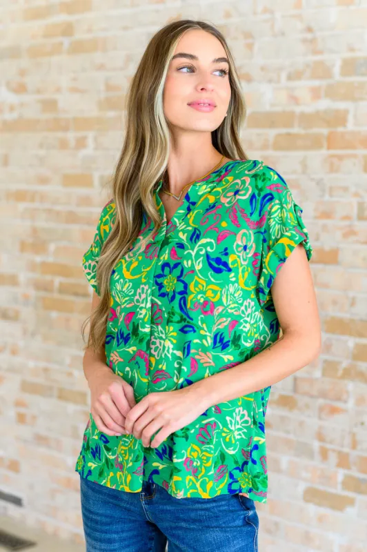 Lizzy Cap Sleeve Top in Green and Royal Watercolor Floral sold by Charming Charlie