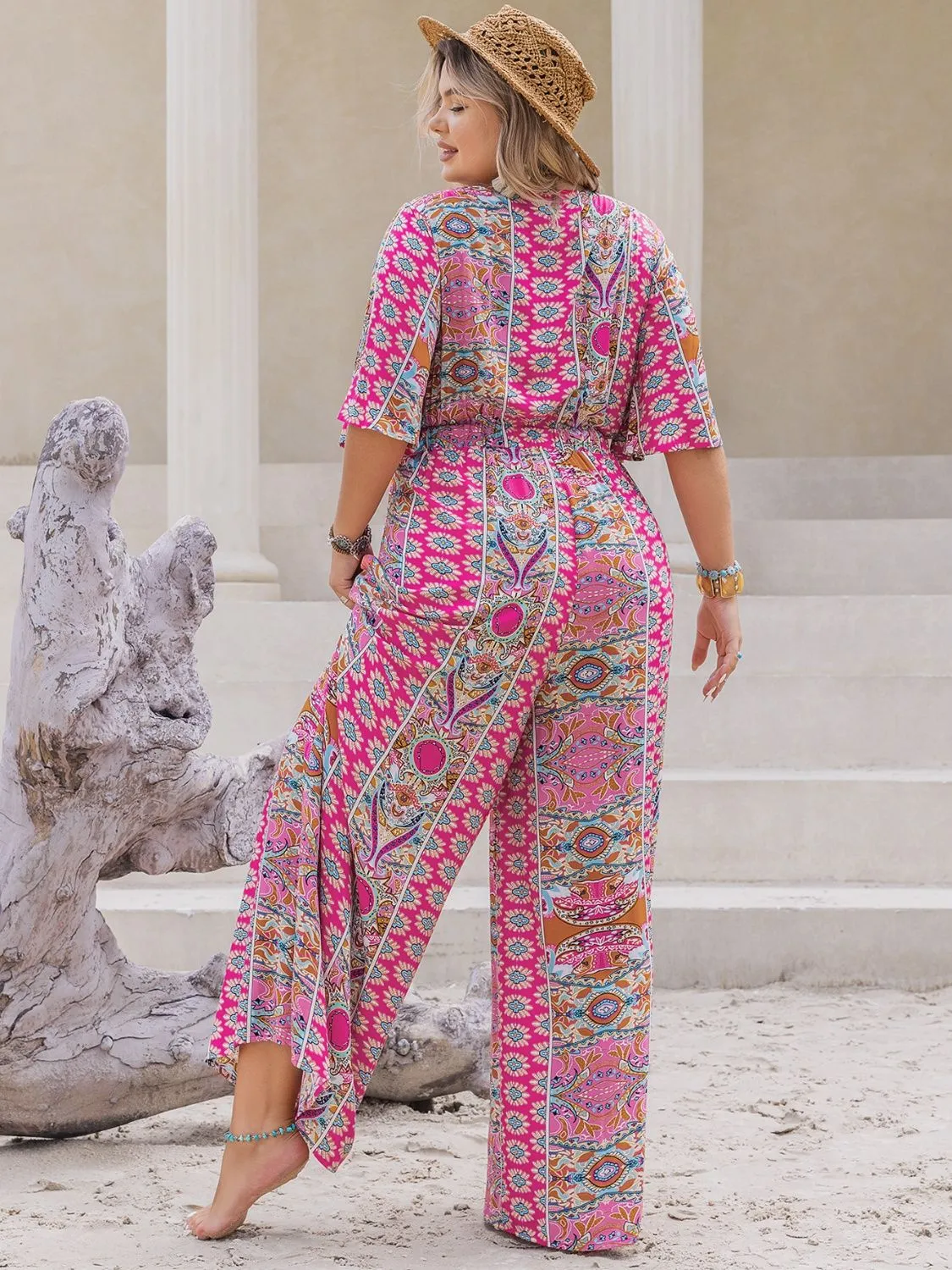Plus Size Printed Half Sleeve Wide Leg Jumpsuit sold by Charming Charlie product image thumbnail 2