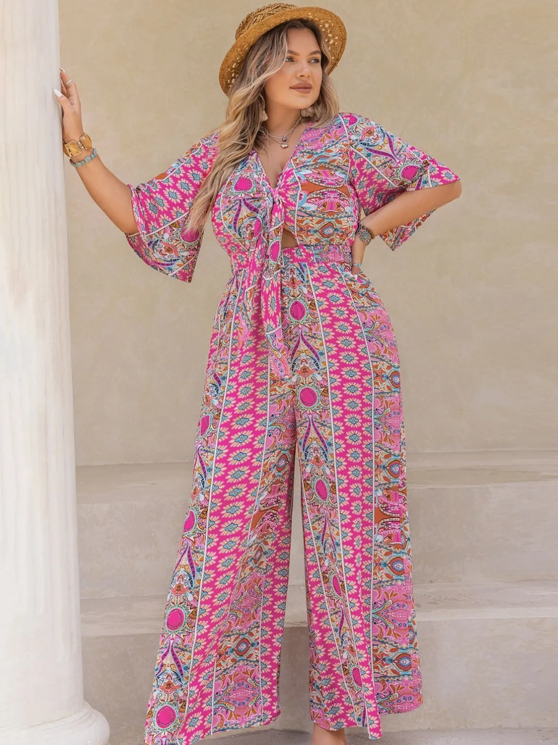 Plus Size Printed Half Sleeve Wide Leg Jumpsuit sold by Charming Charlie product image thumbnail 3