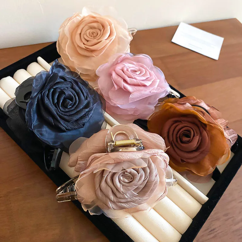 Flower Acrylic Hair Claw Clip sold by Charming Charlie