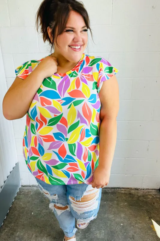 Feeling Playful Lavender & Yellow Floral Print Flutter Sleeve Top sold by Charming Charlie