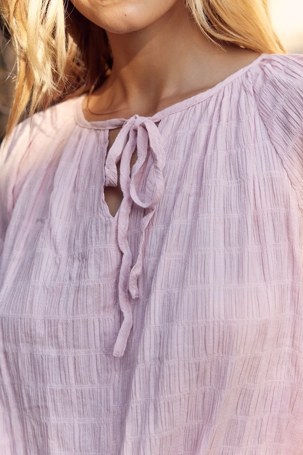 In February Textured Tie Neck Blouse sold by Charming Charlie product image thumbnail 5