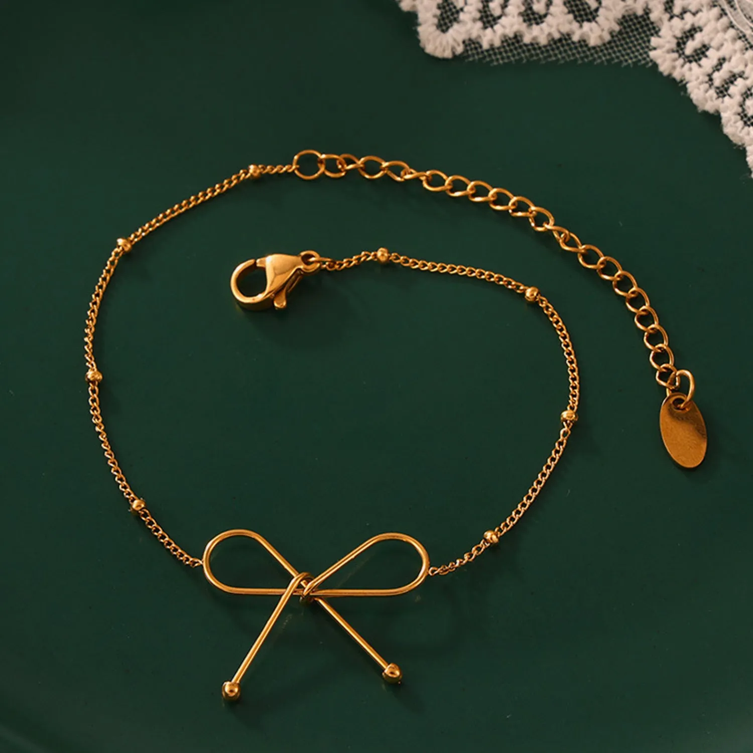 Titanium Steel Bow Bracelet sold by Charming Charlie product image thumbnail 2