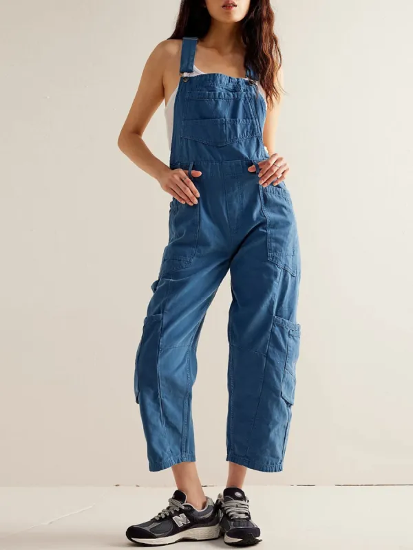 Pocketed Wide Strap Denim Overalls made by Charming Charlie