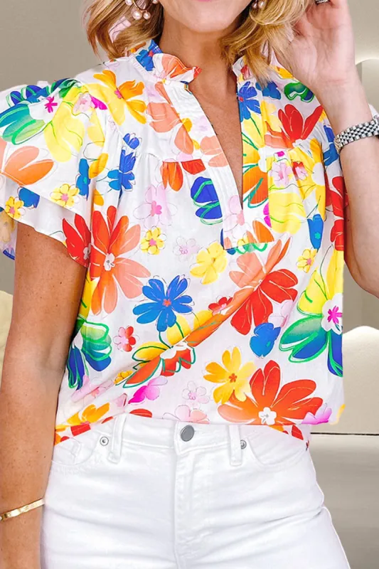 Ruffled Printed Notched Cap Sleeve Blouse sold by Charming Charlie