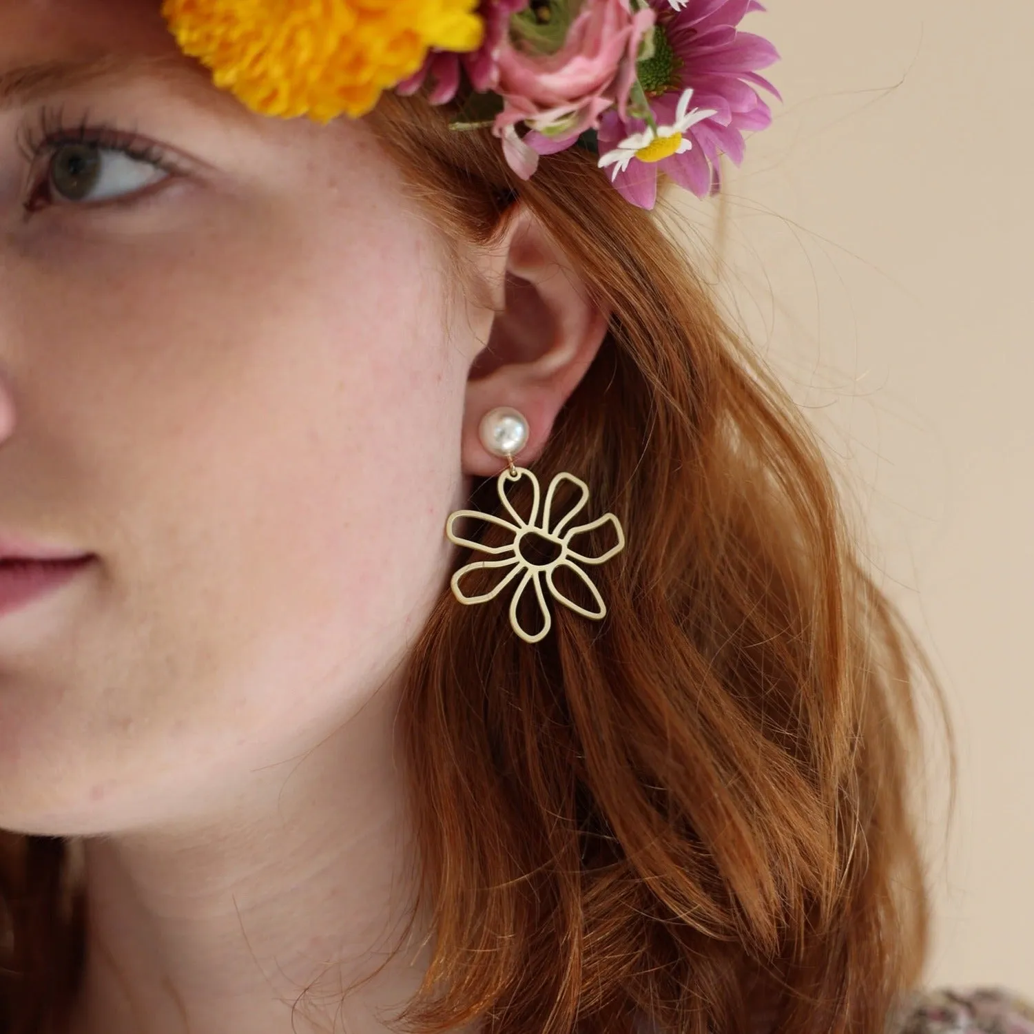 Daisy Pearl sold by Charming Charlie