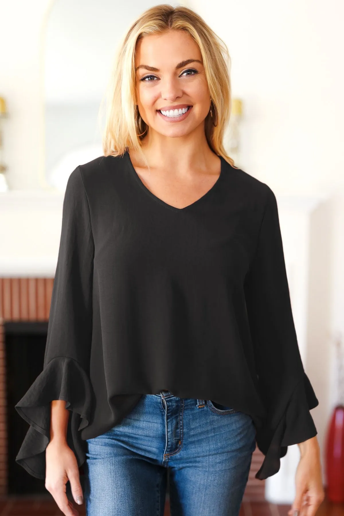 Falling In Love Black Hi-Lo Ruffle Sleeve Woven Top sold by Charming Charlie