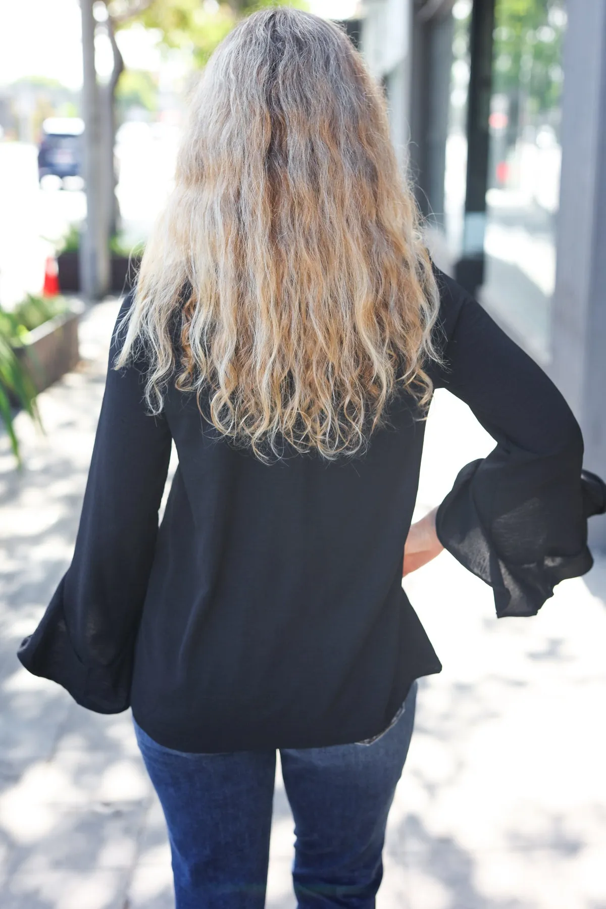 Falling In Love Black Hi-Lo Ruffle Sleeve Woven Top sold by Charming Charlie product image thumbnail 4