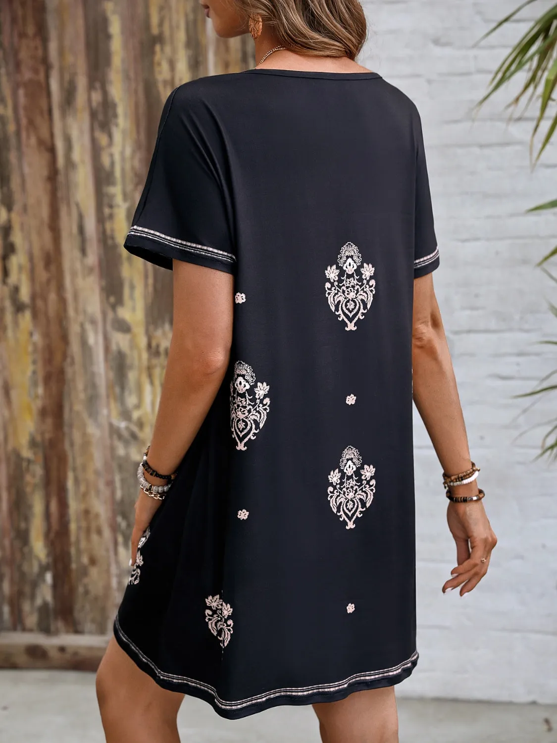 Printed Notched Short Sleeve Mini Dress sold by Charming Charlie product image thumbnail 2