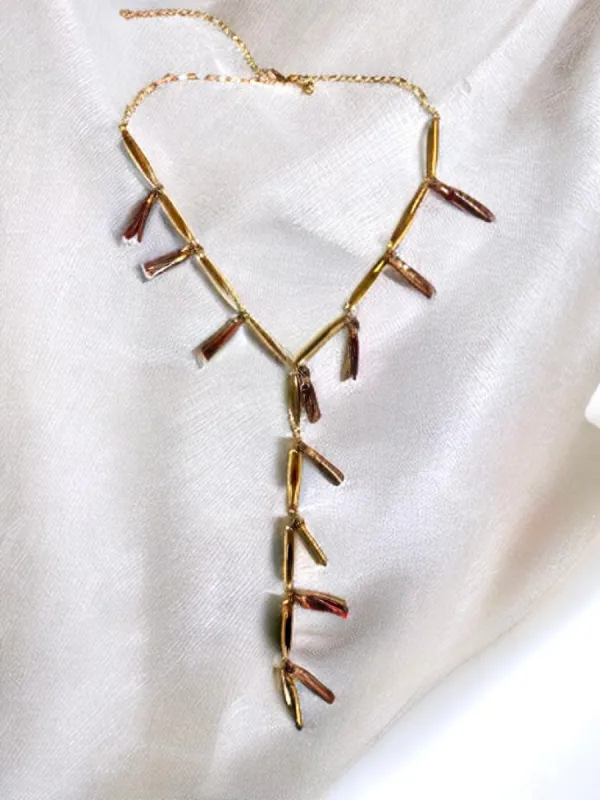 Rebecca Minkoff Beaded and Tassel Necklace- Gold sold by Charming Charlie