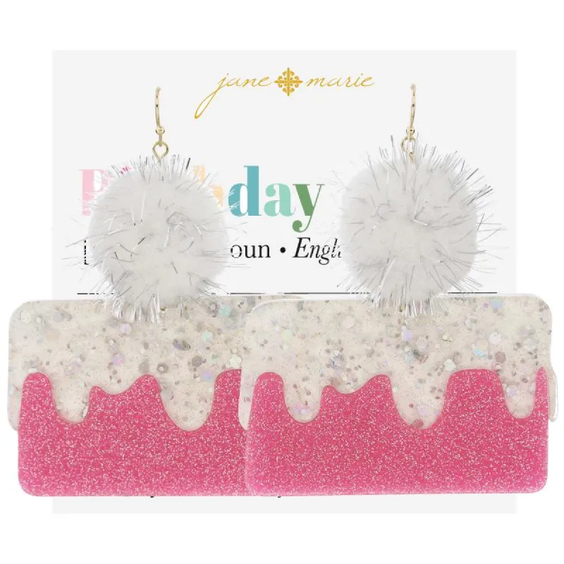 White Pom, Silver Tinsel Tassels, White with Pink & Multi Glitter Cake Earrings, 3" Top to Bottom sold by Charming Charlie