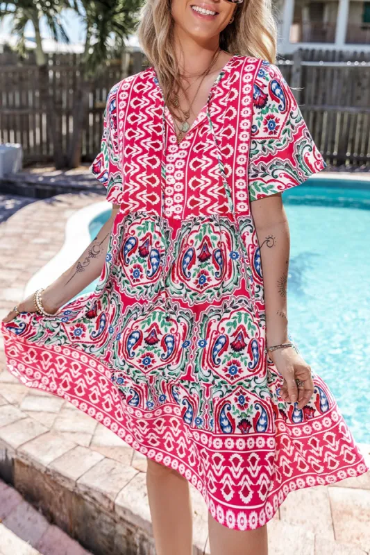 Printed Tie Neck Short Sleeve Dress sold by Charming Charlie