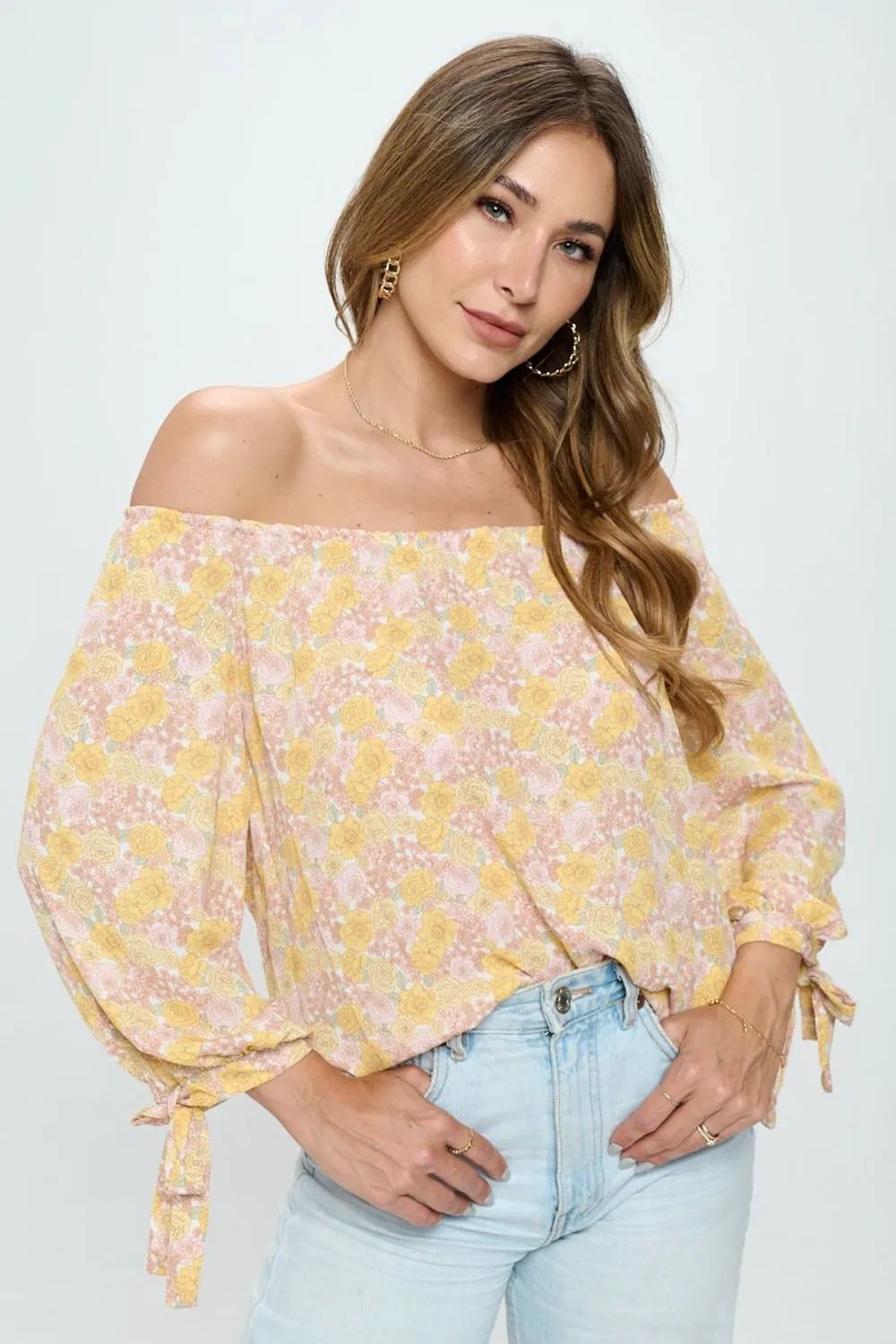 RENEE C Floral Off-Shoulder Long Sleeve Blouse sold by Charming Charlie