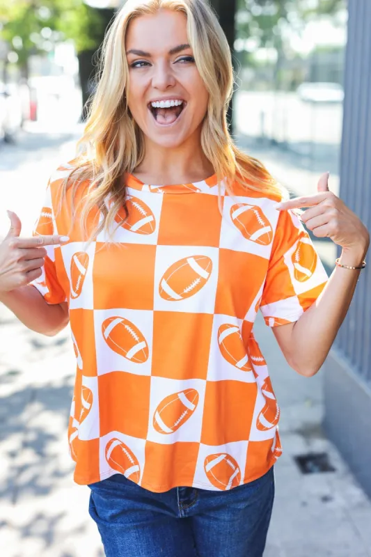 Turn Up The Volume Orange Football Checker Top sold by Charming Charlie