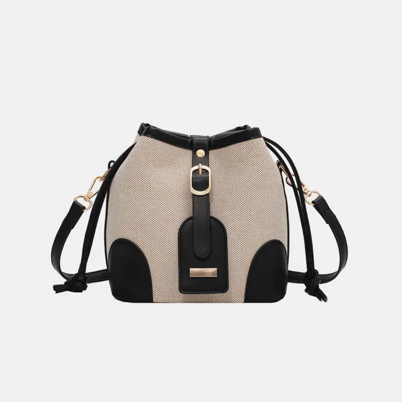 Straw Braided Adjustable Strap Crossbody Bag sold by Charming Charlie