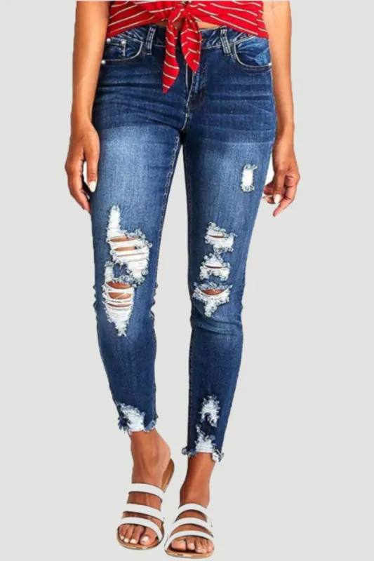 Distressed Raw Hem Jeans with Pockets sold by Charming Charlie