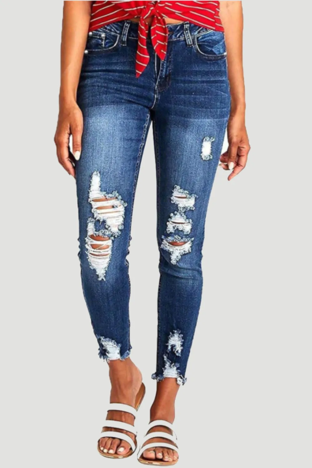 Distressed Raw Hem Jeans with Pockets sold by Charming Charlie