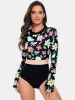 Flower Round Neck Long Sleeve One-Piece Swimwear sold by Charming Charlie