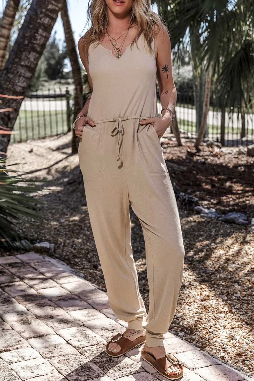 Drawstring Notched Wide Strap Jumpsuit sold by Charming Charlie