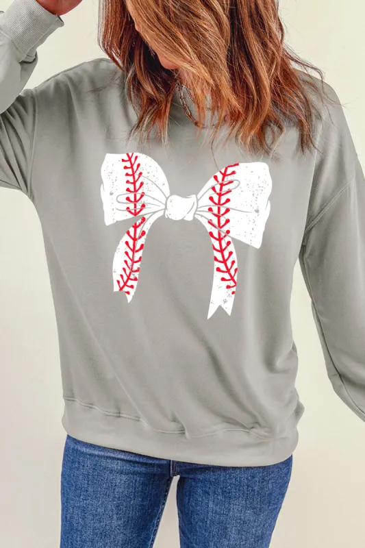 Bow Graphic Round Neck Long Sleeve Sweatshirt sold by Charming Charlie