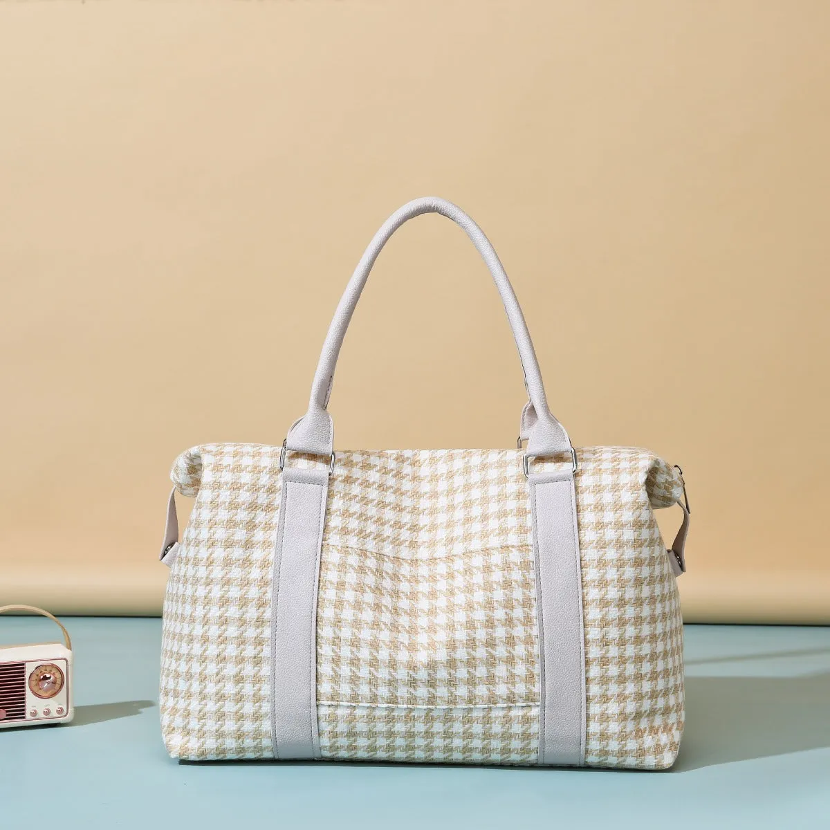Houndstooth Canvas Travel Bag sold by Charming Charlie