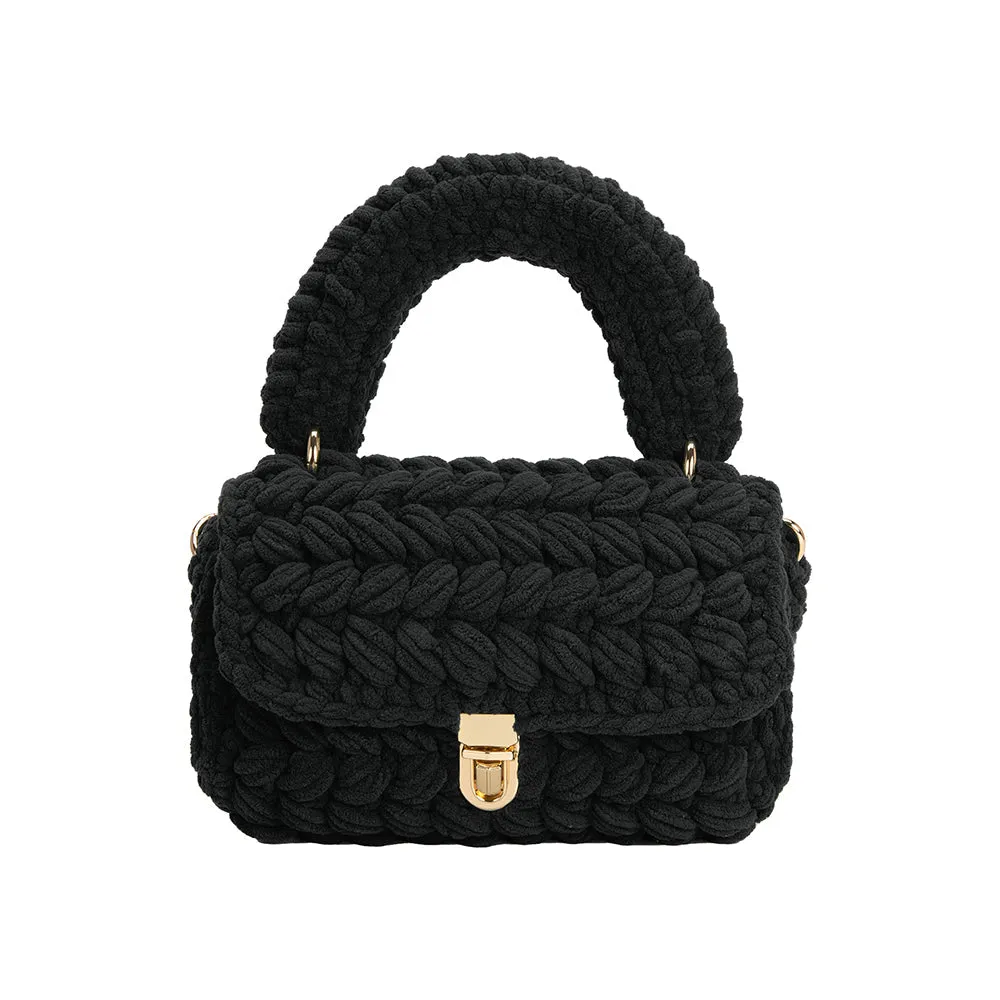 Avery Chenille Black Crossbody Bag sold by Charming Charlie