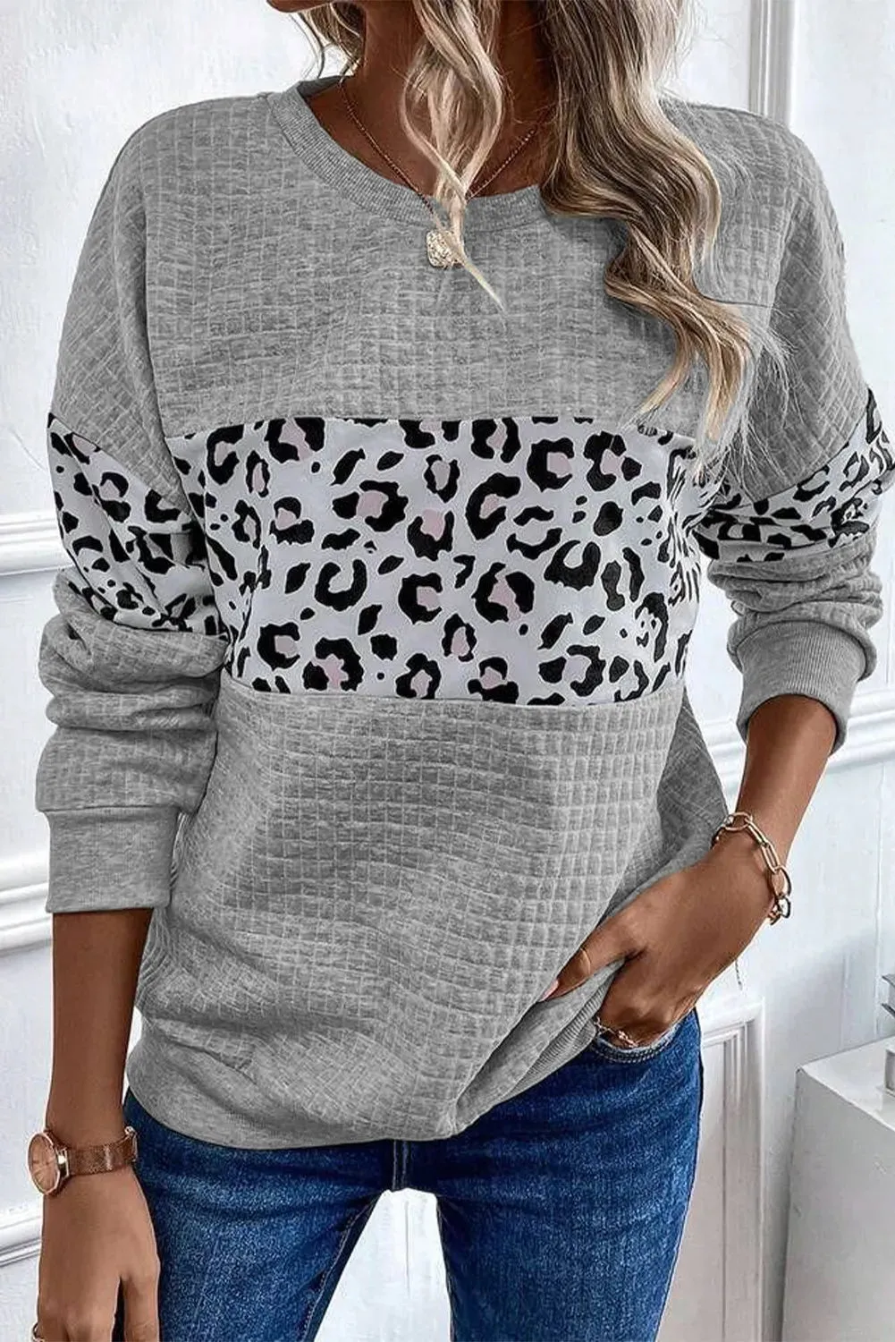 Leopard Round Neck Long Sleeve Sweatshirt sold by Charming Charlie