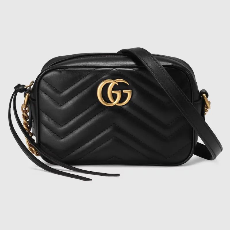 Gucci Hand Bag- Gucci GG Marmont matelassé mini bag Black with Gold-Tone Trim sold by Charming Charlie
